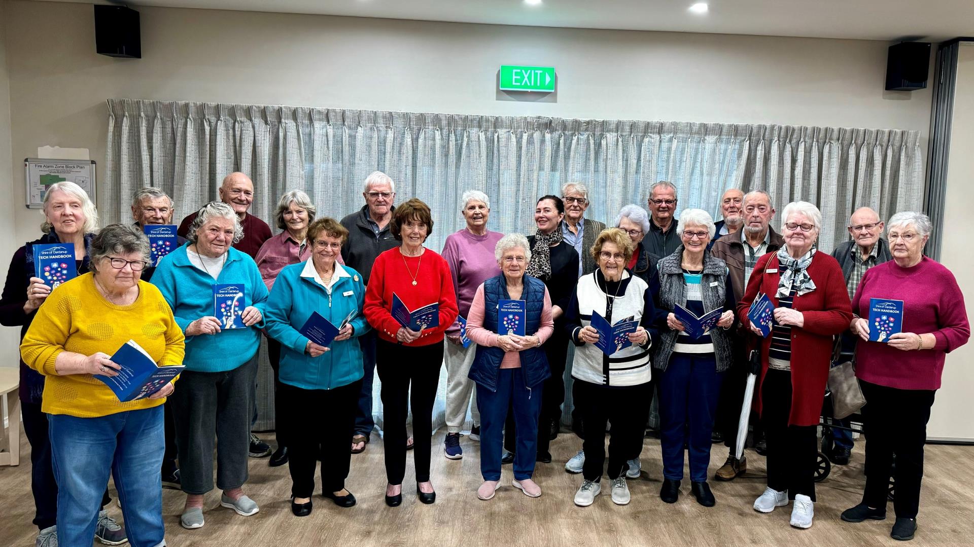 Attendees of the Digital Connection Program pictured at Bethanie Retirement Village, holding the Shire of Dardanup Tech Handbooks. 