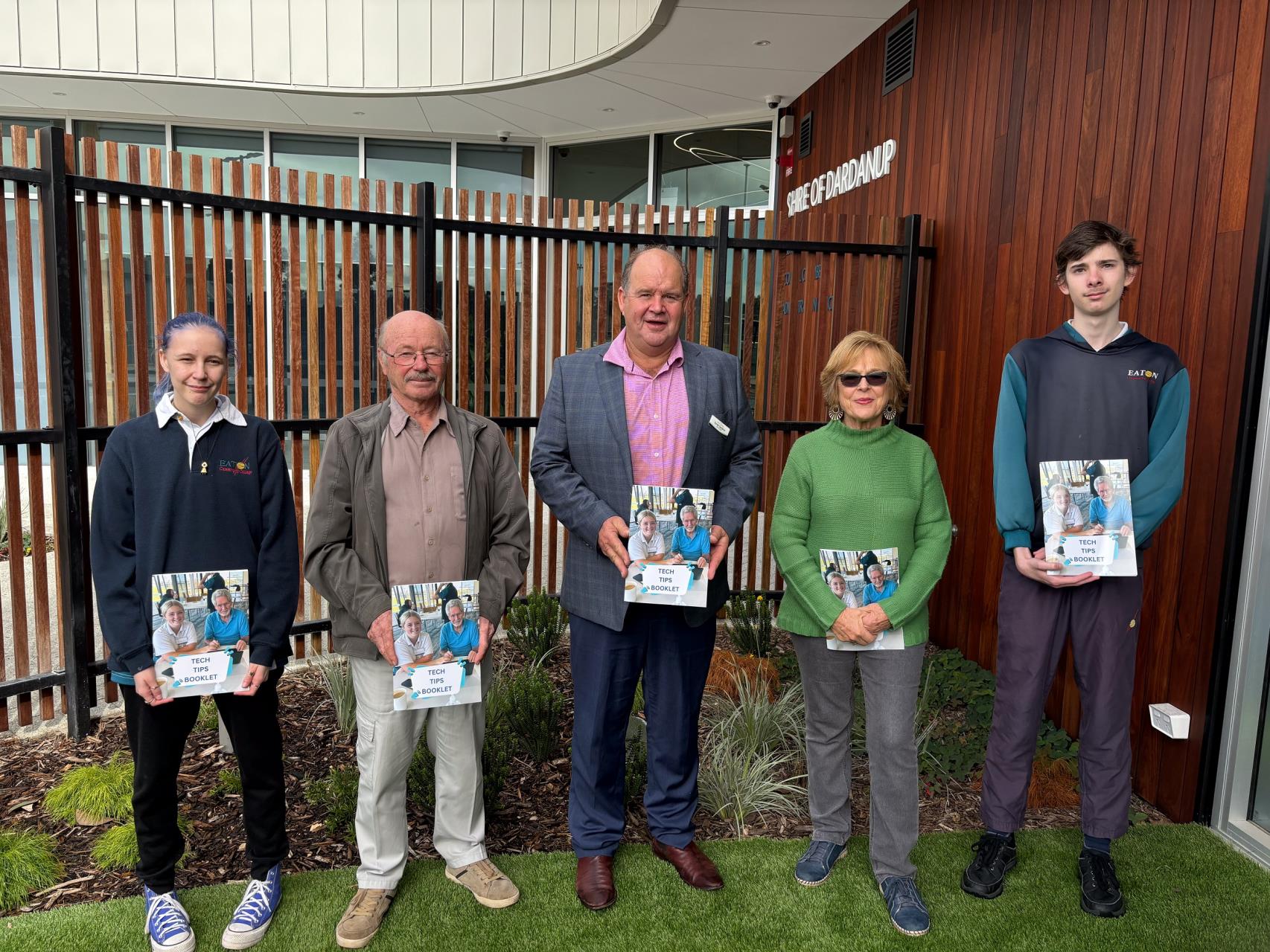 Caption: Pictured left to right, tech mentor Alivia Randall with program participant Stewart Parkinson. Shire President, Tyrrell Gardiner (middle) standing with program participant Chris Lucas and tech mentor Tyler Brown.